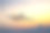 客机在日落时飞过云层素材图片