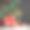 圣诞节的背景。礼物、圣诞老人的帽子和装饰品放在圣诞树下的木板上。抄写黑板上的空格。素材图片
