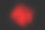 抽象的爆炸红色尘埃在黑色背景。抽象的红色粉末飞溅在黑暗的背景上。冻结运动的红色粉末飞溅。素材图片