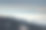 阳光照耀下的蓝色塔特拉山脊上有巴巴霍拉森林和朦胧的山谷素材图片
