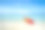 色彩斑斓的皮艇在蓝天下的热带海滩上素材图片