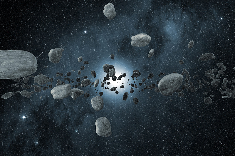 一群散落在太空中的小行星图片下载